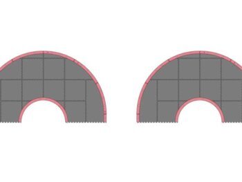 De afbeelding toont twee halfronde baandelen voor een racebaan, met een grijze rijbaan en roze randen. De baandelen zijn modulair en lijken gemaakt van schuim of een vergelijkbaar lichtgewicht materiaal.