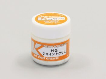 De foto toont een potje met witte en oranje details. Op het potje staat de tekst 'HG JOINT GREASE' en het merk 'Kyosho'.
