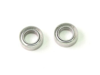 De afbeelding toont twee metalen kogellagers met een zilverkleurige afwerking. Ze hebben een compacte, cilindrische vorm met duidelijke ringen aan de binnen- en buitenkant.
