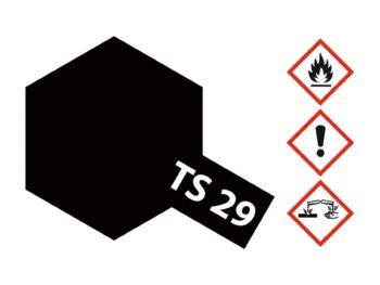De afbeelding toont een zwarte, zeshoekige vorm met de tekst 'TS 29' erop. Er staan ook enkele gevaarsymbolen afgebeeld.