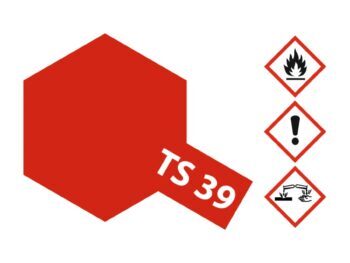 De afbeelding toont een rood, zeshoekig vlak met de tekst 'TS 39' in wit. Daarnaast staan drie gevaarsymbolen: een vlam, een uitroepteken en een symbool voor corrosie.