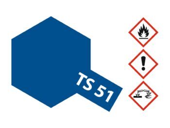 De afbeelding toont een blauwe zeshoek met de tekst 'TS 51' in wit. Rechts daarvan staan drie waarschuwingssymbolen: een vlam, een uitroepteken en een symbool voor corrosie.