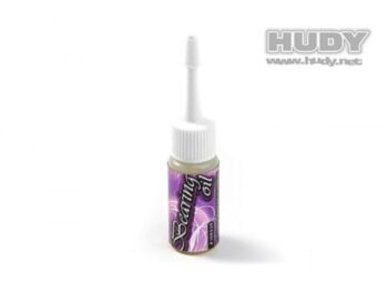 De afbeelding toont een klein flesje met een witte dop en een lange, dunne applicator. Het etiket op het flesje is paars met witte tekst 'Bearing Oil'.