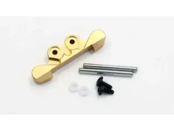 The image shows a gold-coloured metal part with two holes, along with two silver-coloured pins, two white rings and two black screws. It appears to be a part for a model car.