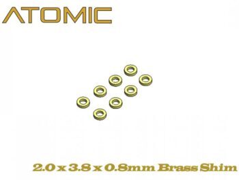 De afbeelding toont acht kleine, ringvormige onderdelen die goudkleurig lijken te zijn. Boven de onderdelen staat het logo 'ATOMIC' in dezelfde gouden kleur.