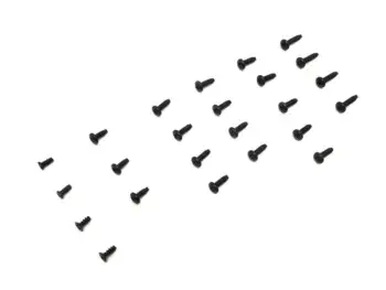 The photo shows several small black screws scattered across a white background. The screws have a flat head and a sharp point.