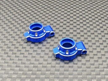 De foto toont twee blauwe aluminium achterste fusees. Ze hebben een complexe vorm met uitsparingen en zilverkleurige accenten.