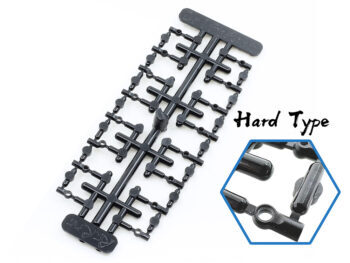 De foto toont een zwarte kunststof set van balcups, verbonden door een frame. De balcups zijn van het 'Hard Type' en lijken bedoeld voor een modelauto.