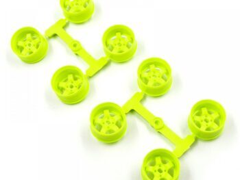 La photo montre plusieurs jantes jaune fluo, encore fixées à un cadre. Les jantes ont un design en forme d'étoile.