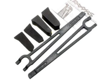 Traxxas TRX3927X Hold downs, battery, left & right (2)/ foam spacers (4) (all, TRX3927X - twee