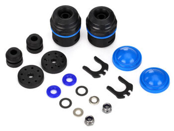 Kit met diverse zwarte en blauwe onderdelen voor RC schokdempers, inclusief behuizingen, ringen en bevestigingsclips.