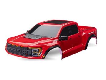 Traxxas TRX10112-RED Body, Ford Raptor R, complete (red) (includes grille, tailgate trim, side mirrors, decals, & clipless mounting) (requires #10124 & 10125 body mounts) - een rode RC pickup