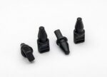 vier zwarte rubberen stoppers doppen